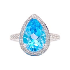 4 Carat Blue Topaz and Diamond Halo Ring, Pear Shaped Blue Topaz 14K White Gold