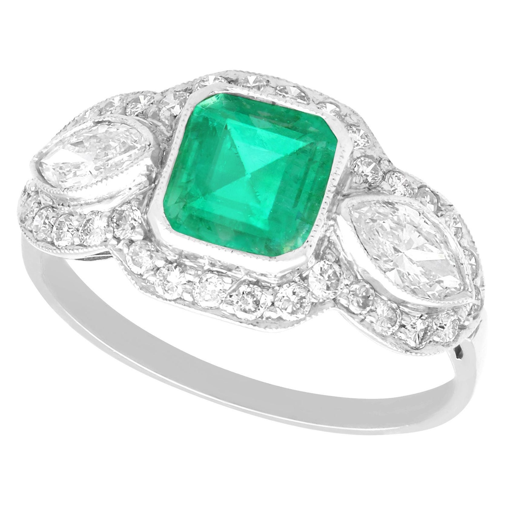 Antique 1.45 Carat Emerald and 1.43 Carat Diamond Platinum Engagement Ring For Sale