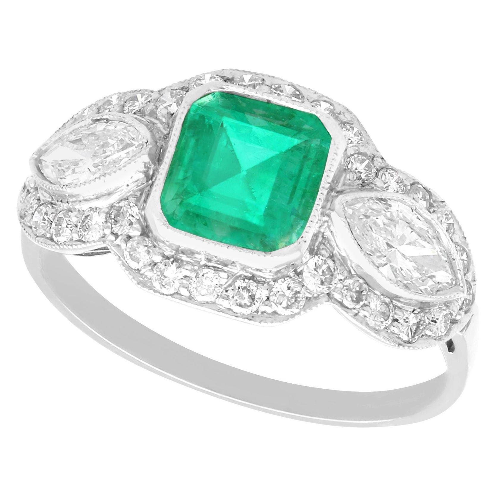 Anillo de compromiso antiguo en platino con esmeralda de 1,45 quilates y diamante de 1,43 quilates