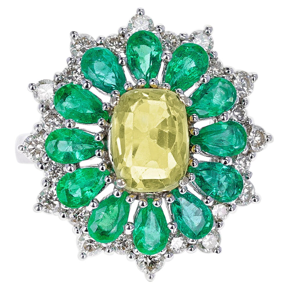 Pear-Shape Emeralds, Round Diamonds, Center Oval Cushion Yellow Sapphire Ring For Sale