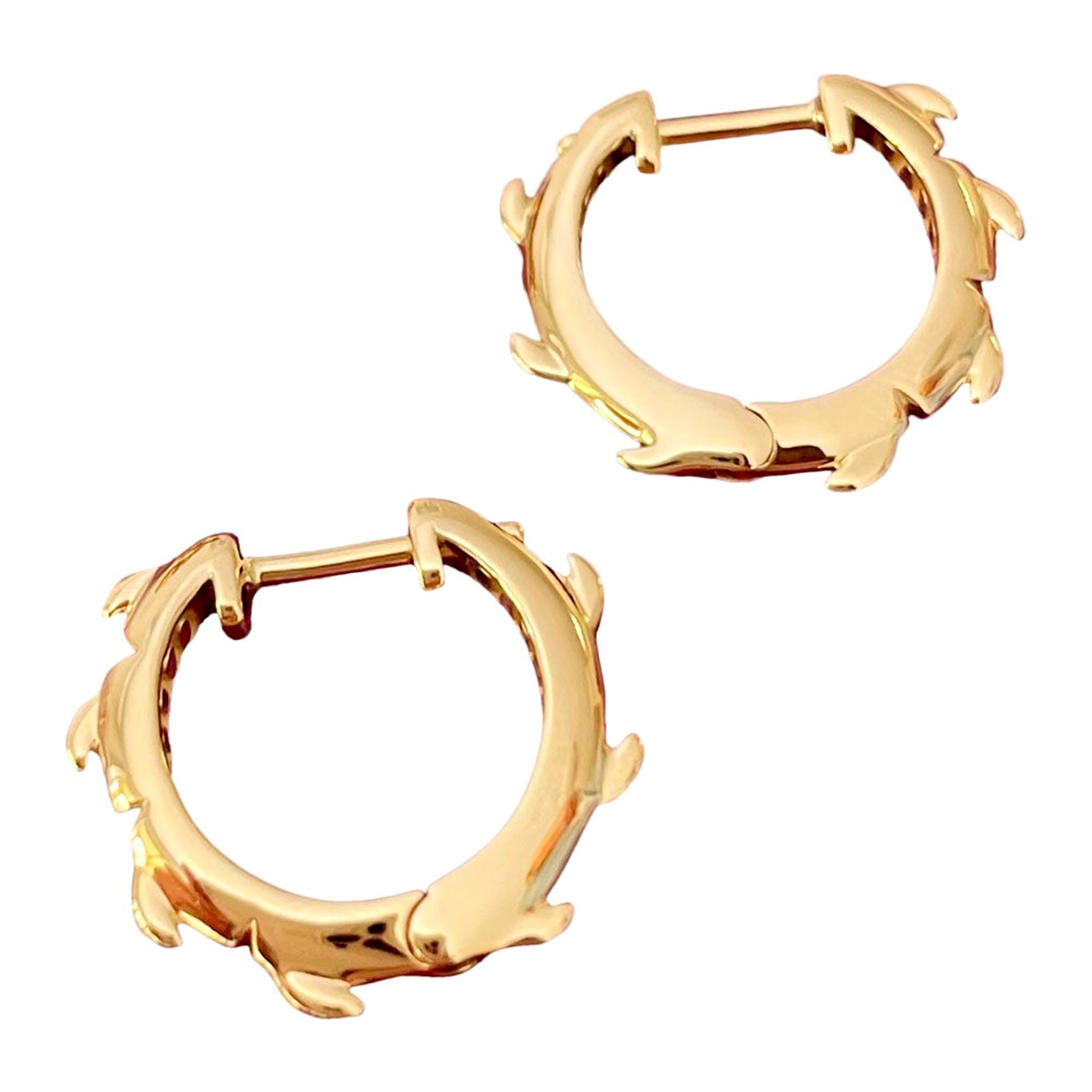 Paar Huggies-Ohrringe aus 18 Karat Gelbgold mit Krokodilschleifen