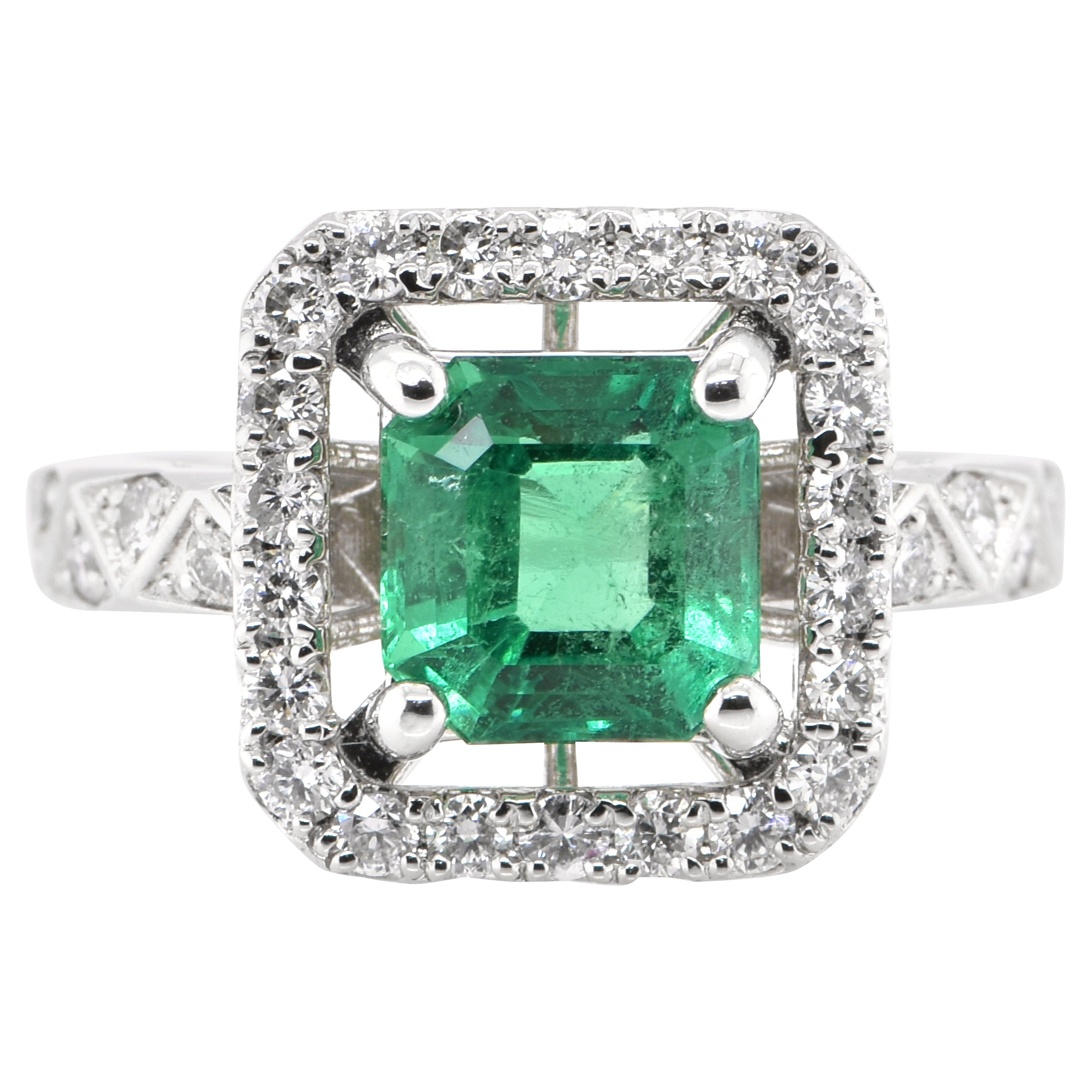 1.69 Carat Natural Emerald and Diamond Ring Set in Platinum For Sale