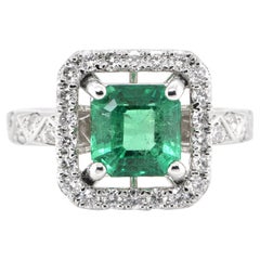 1.69 Carat Natural Emerald and Diamond Ring Set in Platinum