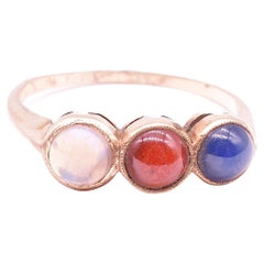 Victorian Trilogy Ring of Opal, Garnet, and Sapphire
