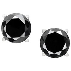 0.87 Carat Total Round Black Diamond Solitaire Stud Earrings in 14 K White Gold
