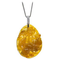 Pendentif fleur de lotus et poisson en jade jadéite jaune, certifié non traité