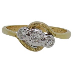 Cross Over Diamond Three-Stone Ring 18 Karat Yellow & White Gold