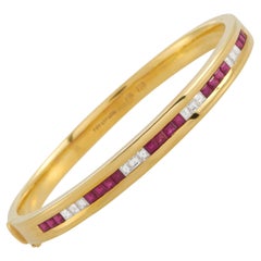 Tiffany & Co. 18K Yellow Gold 1.00 Ct Diamond and Ruby Bangle Bracelet