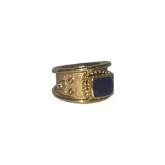 Egyptian Elixir Ring in 18k Gold with Blue Sapphire and Two Diamonds