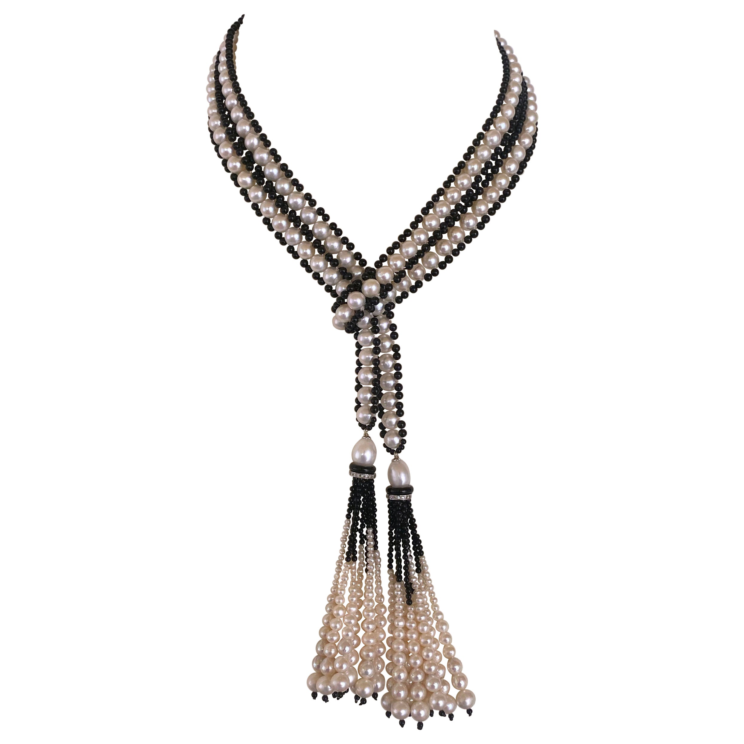 Marina J. Sautoir d'inspiration art déco en perles et onyx noir avec glands gradués en vente