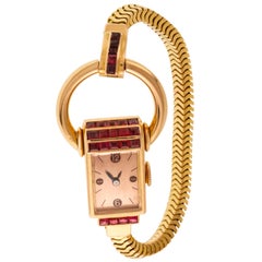 Vintage Universal Genève Lady Jewelry Bracelet Watch 18 Carat Yellow Gold and Rubies