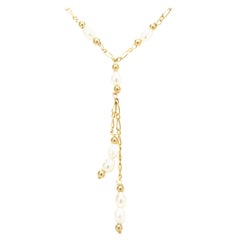 Collier lariat en or jaune 14 carats avec perles au mètre