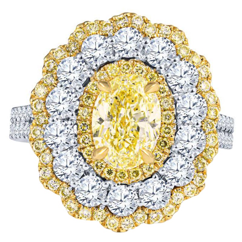 GIA Certified 2.0 Carat Fancy Yellow Diamond Ring in 18KT White Gold For Sale