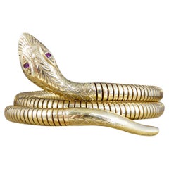 Flexible Snake Bangle Bracelet in 9ct Yellow Gold with Garnet Set Eyes