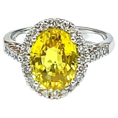 Bright 18 Kt White Gold Yellow Sapphire and Diamond Ring
