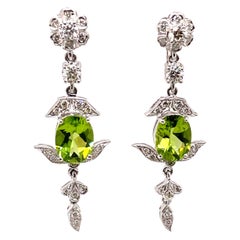 3.85ct Oval Peridot with Diamonds Earrings 18k White Gold