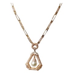 Grand collier pendentif en or 18 carats avec perles et diamants