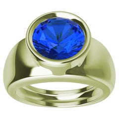 Bague sculpture en or vert 18 carats avec saphir bleu rond de 2,69 carats