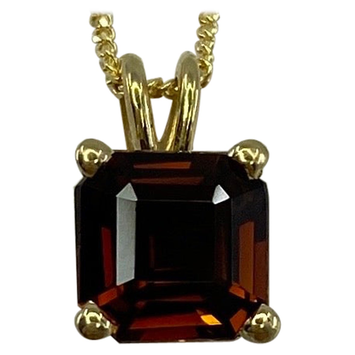 1.32 Carat Deep Orange Tourmaline Emerald Cut 18 Karat Yellow Gold Pendant