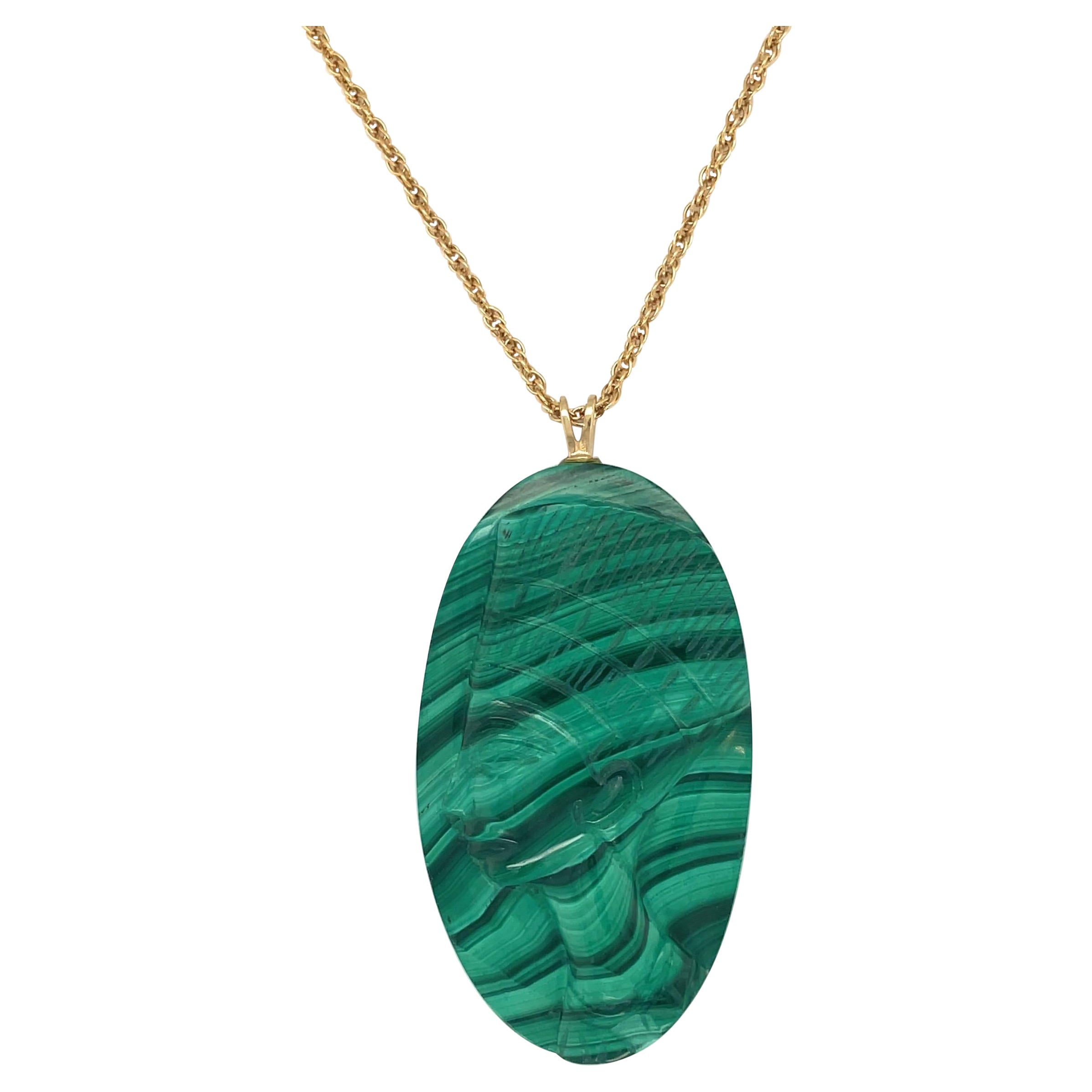 Carved Malachite Pendant with Carved Head Motif  For Sale