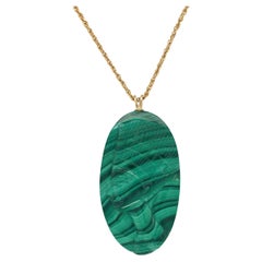 Retro Carved Malachite Pendant with Carved Head Motif 