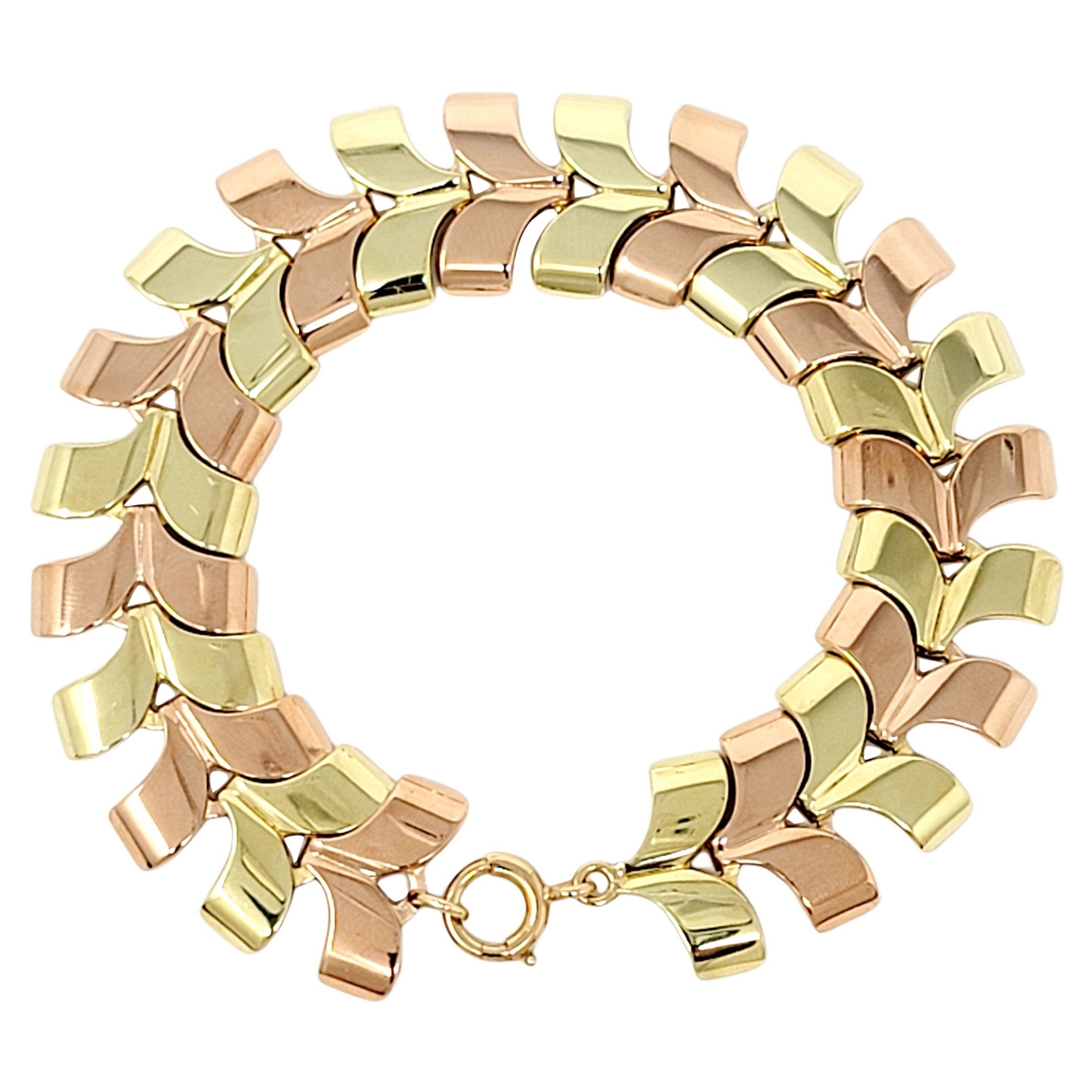 Polished Two-Tone 14 Karat Yellow and Rose Gold Chevron Style Link Bracelet For Sale