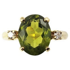 14 Karat Yellow Gold Green Tourmaline and Diamond Ring