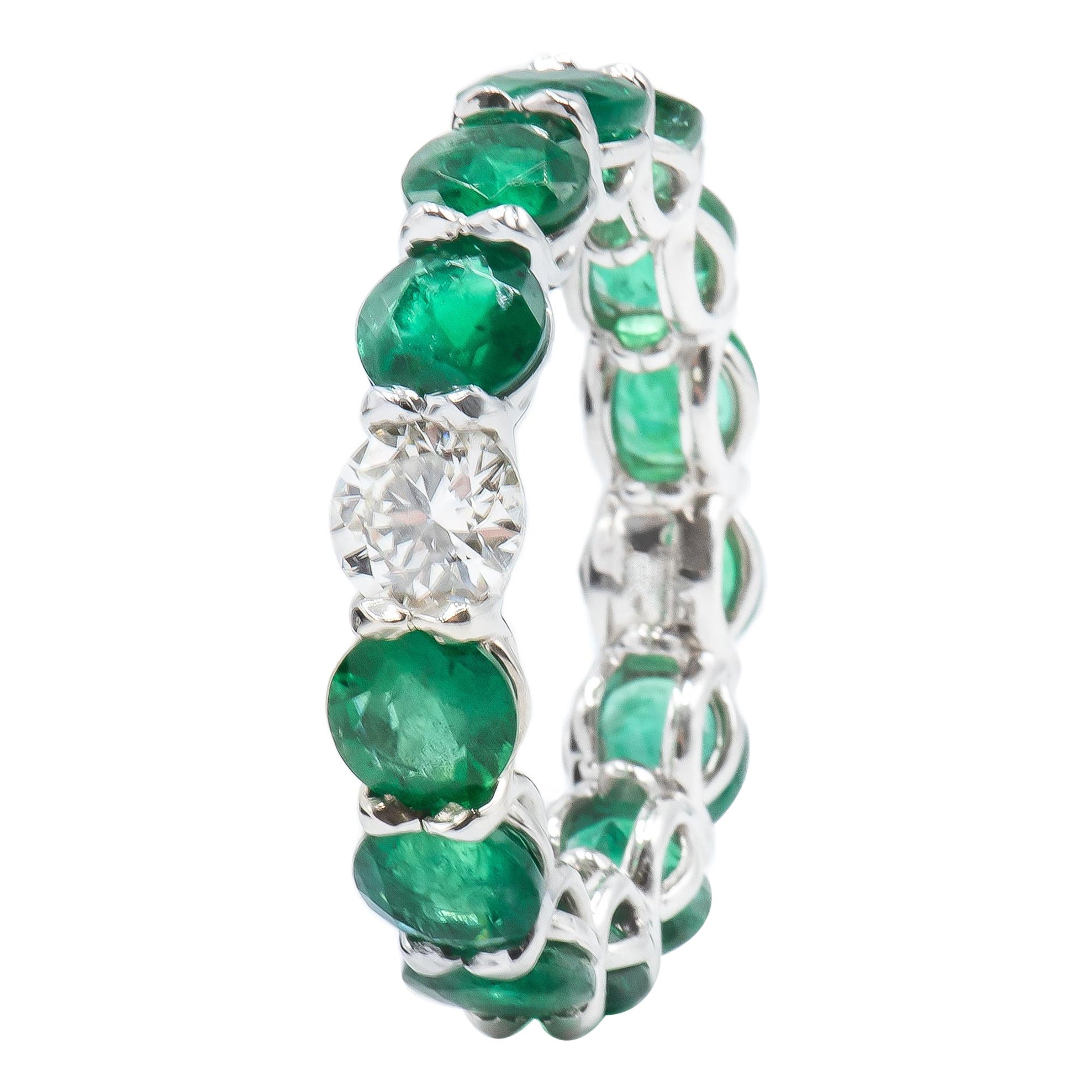6.46 Carat Emerald and Round Diamond Eternity Band Ring For Sale