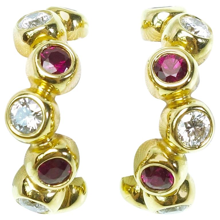 Movado Ruby Diamond Gold Hoop Earrings at 1stdibs