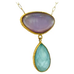 Aurora Pendant, Set in 22k Gold, by Tagili