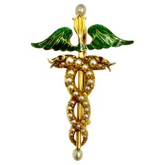 Fine Antique 18K Gold Green Enamel Pearl Serpents with Ruby Eyes Caduceus Brooch