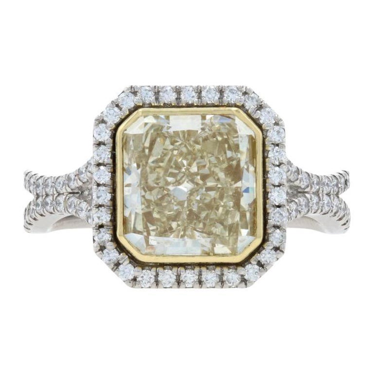 Bague en platine et or avec halo de diamants jaunes fantaisie en or 18 carats et diamant radiant de 3,28 carats certifié GIA