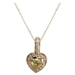 Fancy Yellow Heart Shape Diamond Halo Necklace in 14KT Yellow Gold 1.01 CTW