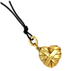 Modern Wrapped 18 Karat Yellow Gold Heart Pendant Necklace by Kieselstein Cord