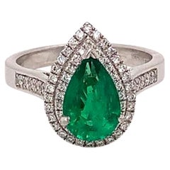 1.43 Carat Pear Shape Emerald and Diamond Cluster Ring in Platinum