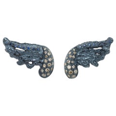Clous d'oreilles contemporains en argent sterling avec plumes bleues et diamants bruns de 0,30 carat