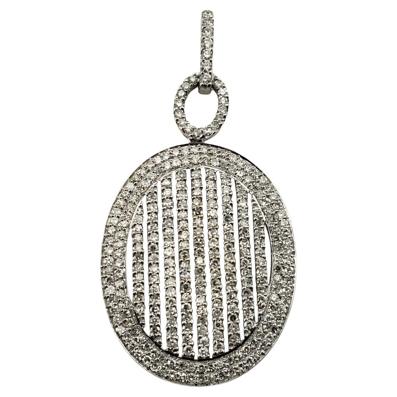 Pendentif vintage en or blanc 14 carats et diamants