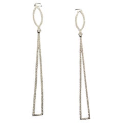 Boucles d'oreilles en goutte en or blanc 18 carats et diamants