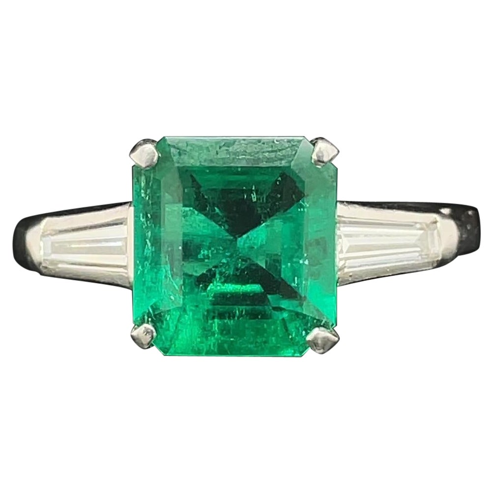 1.70 Carat Emerald and Diamond Three Stone Platinum Engagement Ring