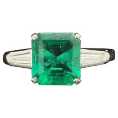 1.70 Carat Columbian Emerald and Diamond Three Stone Platinum Engagement Ring