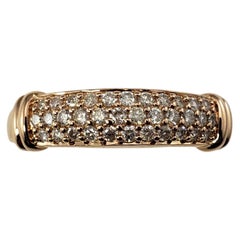 Anillo de oro rosa de 14 quilates y diamantes