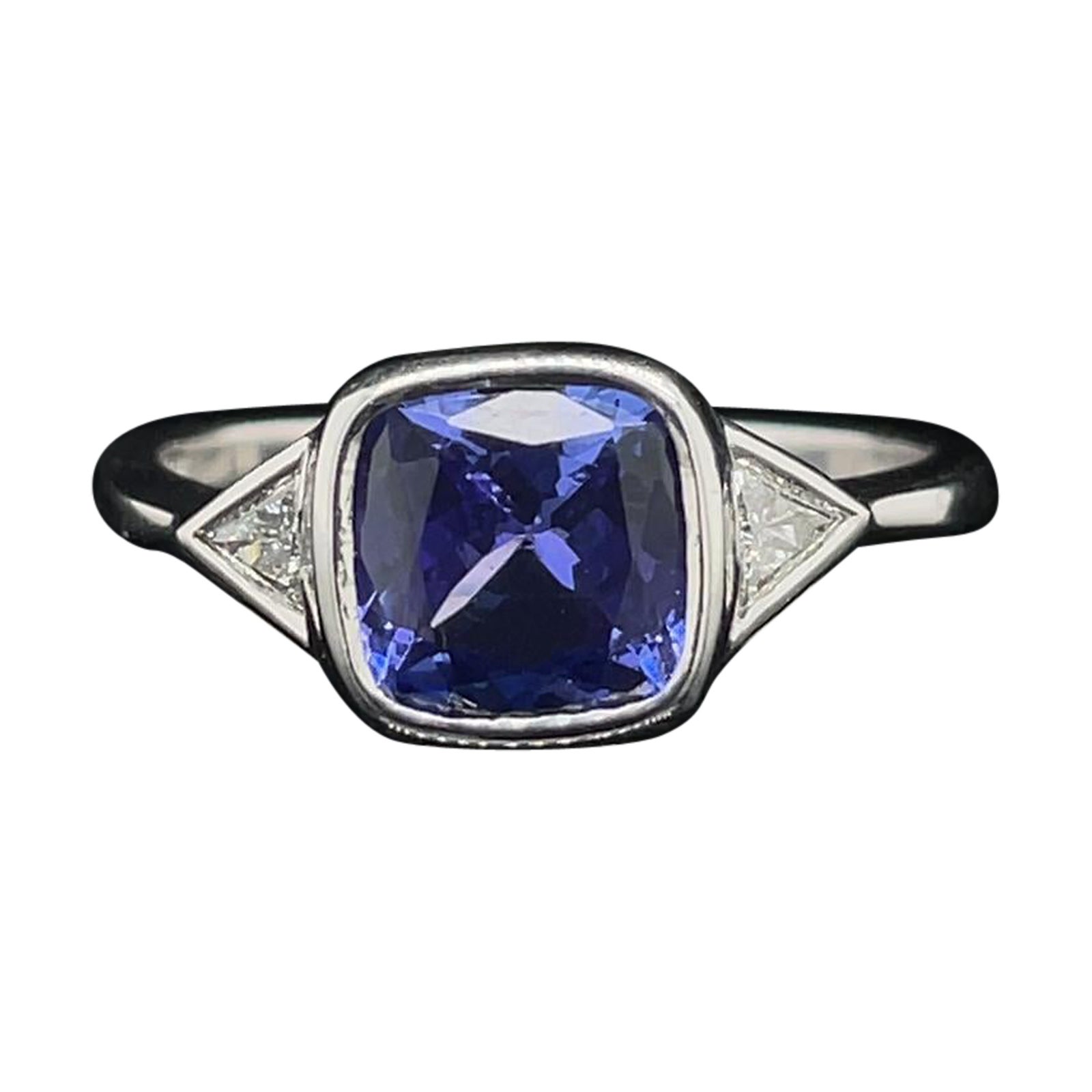 Tanzanite and Diamond Three Stone Engagement Ring in 18 Karat White Gold For Sale