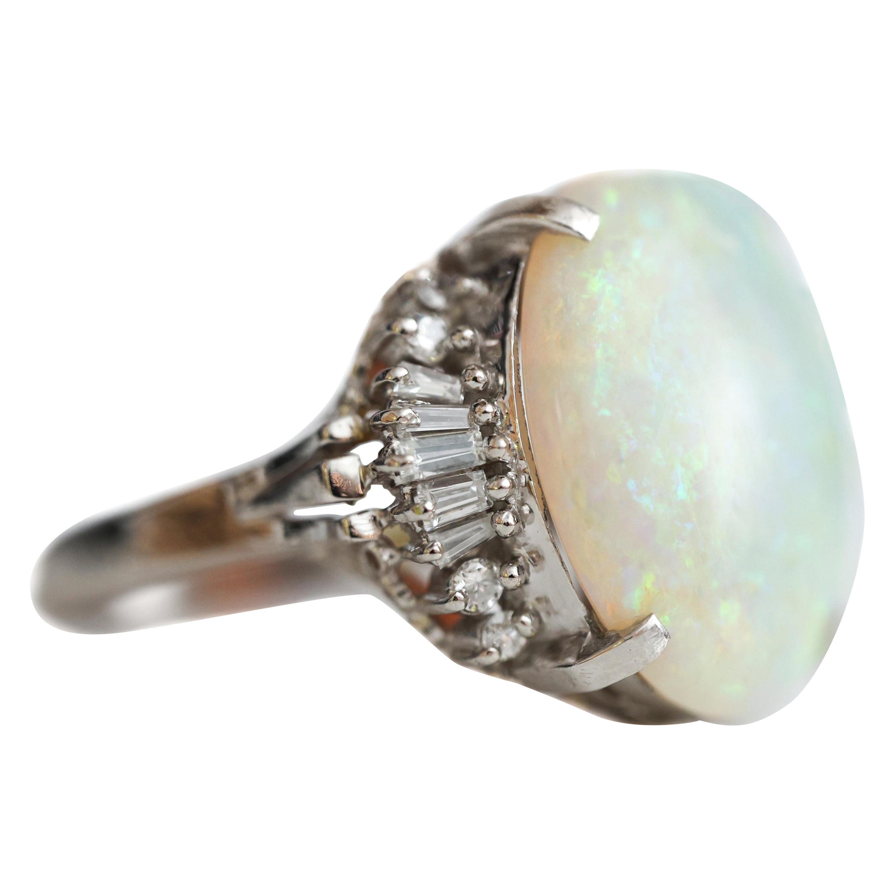 1950s 7.99 Carat Opal and 0.48 Carat Diamond Platinum Cocktail Ring For Sale