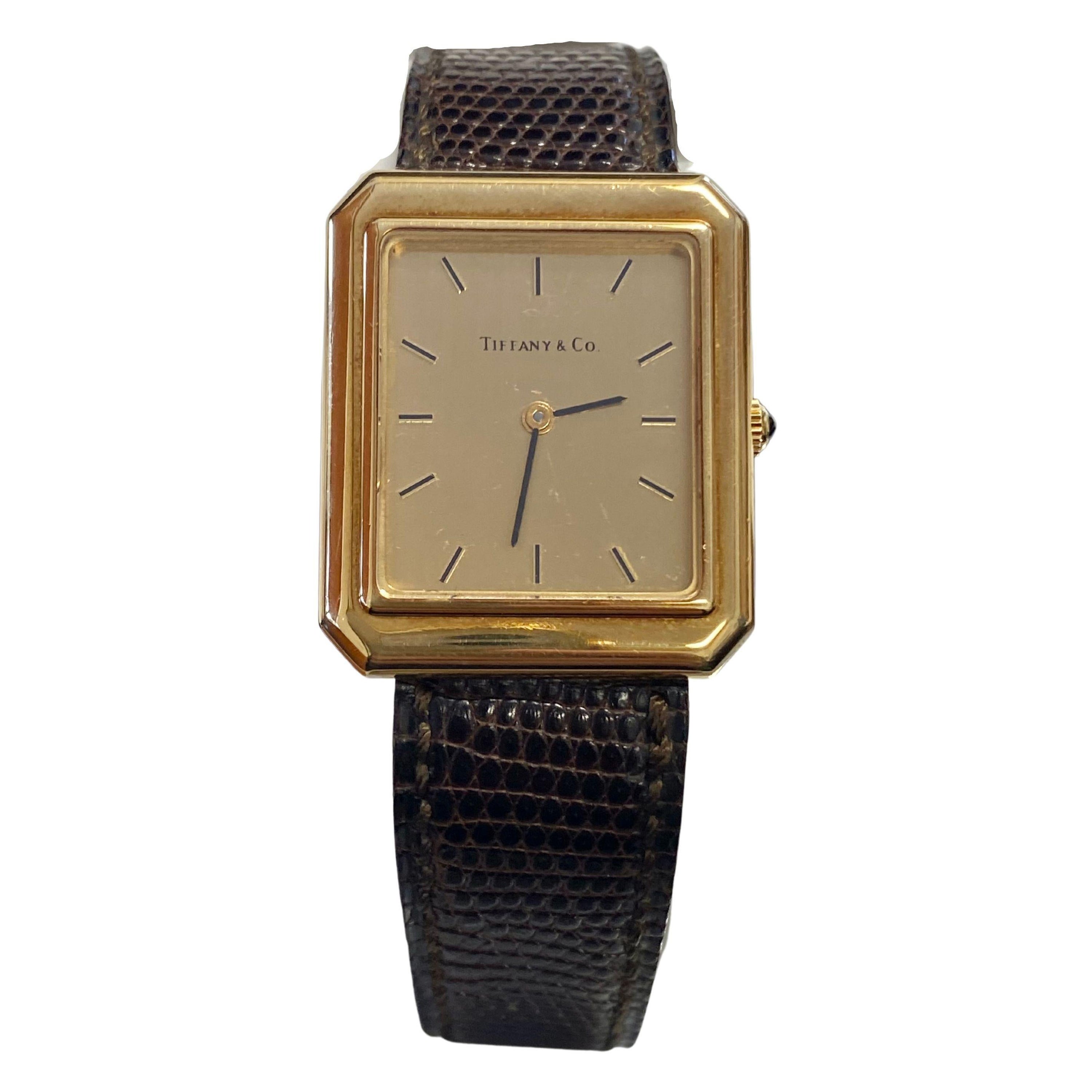 Unisex Tiffany & Co. Rechteckige Uhr aus 18 Karat Gold mit Original-Lederarmband im Angebot