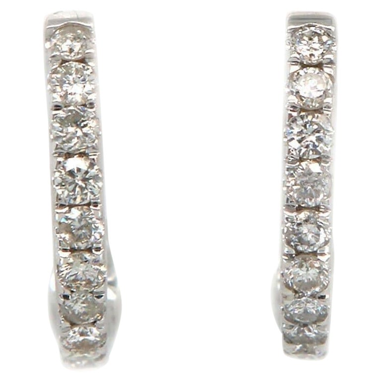 New 0.22ctw Diamond Petite Huggie Earrings in 14K White Gold For Sale