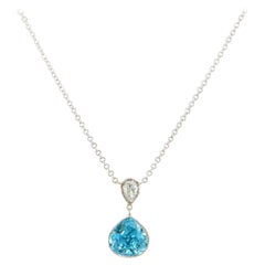 3.56ct Blue Pear Zircon and 0.21ct Pear Diamond Bezel Set Pendant Necklace, 14kt