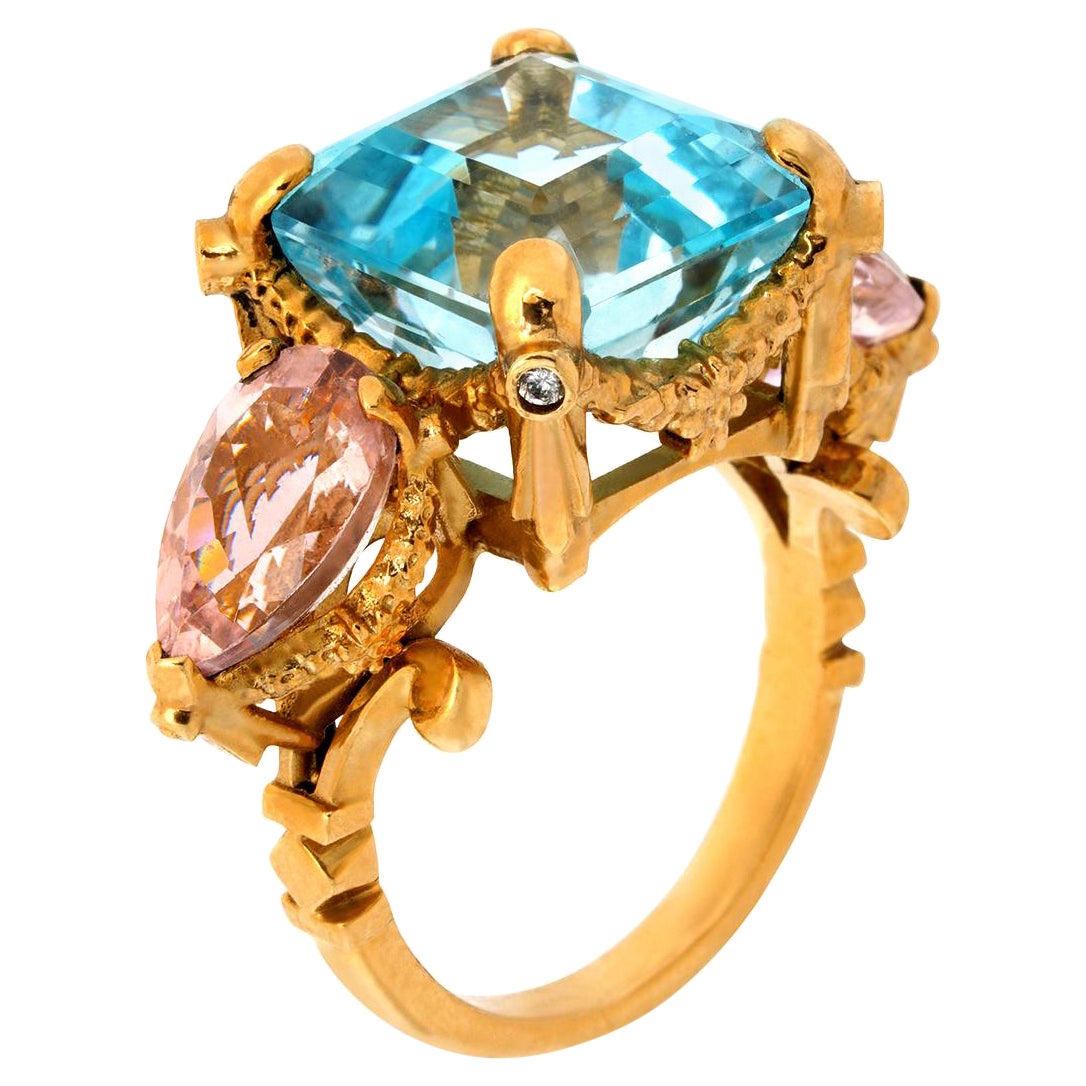 Sky Blue Topaz, Pink Tourmalines, Diamonds, & 9k Yellow Gold Antique Style Ring For Sale