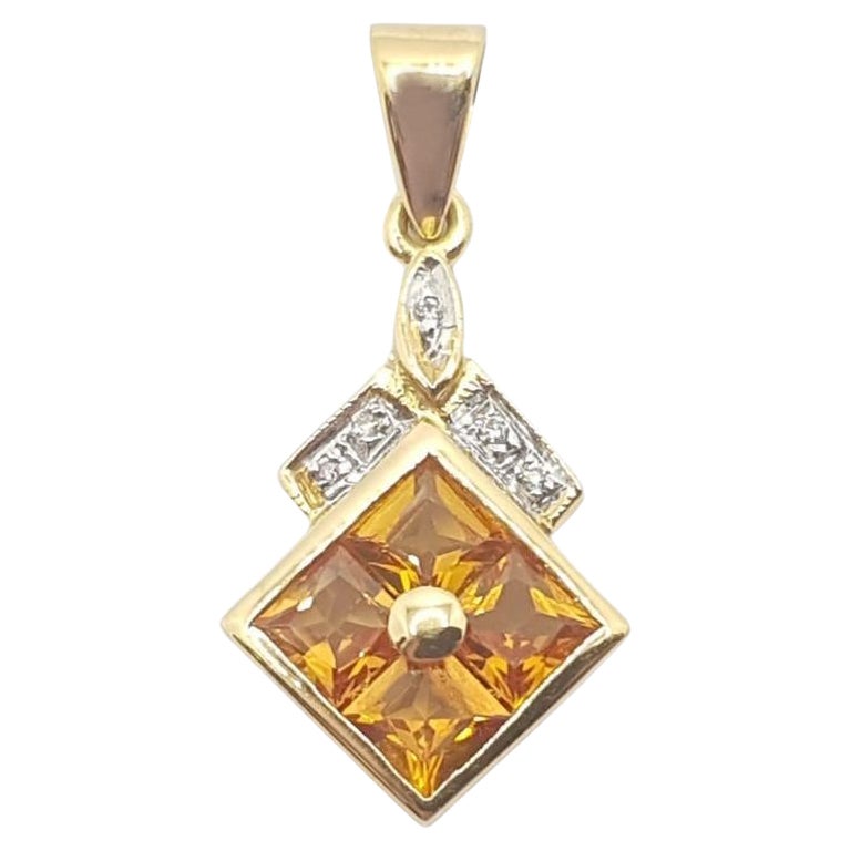 Pendentif en or 18 carats serti d'un saphir jaune et de diamants