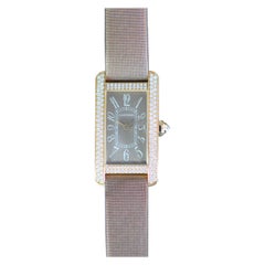 Cartier Tank Américaine Or Jaune 18K Lunette diamantée Ensemble complet non porté