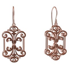 Pendants d'oreilles en or rose 18 carats avec motif « French Gate »